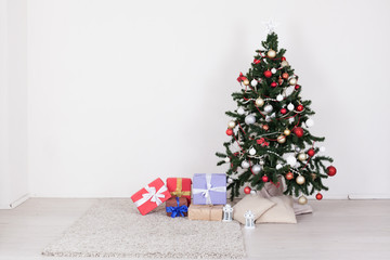 Christmas tree with presents on a white background for the new year