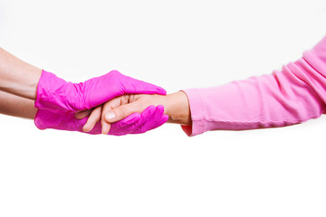Fototapeta premium woman keep carry closeup retiree gloves doctor hospice pink nurse hands old person white background medical