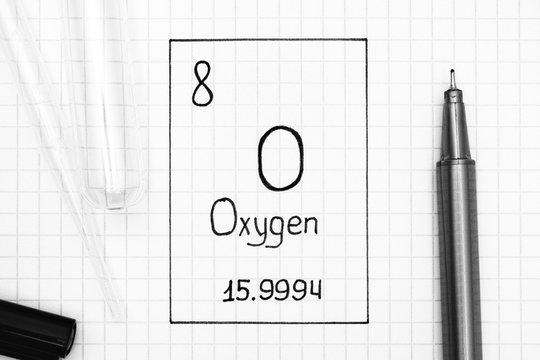 Handwriting chemical element Oxygen O with black pen, test tube and pipette.