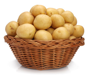 Potatoes in basket on white background