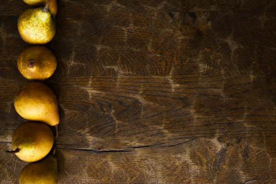 autumn background, pear pattern on old wooden rustic  table