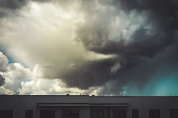 Fototapeta na wymiar Dramatic cloudy sky over the urban area.