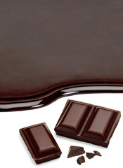 Chocolate Puddle with broken chocolate tablets isolated on white background