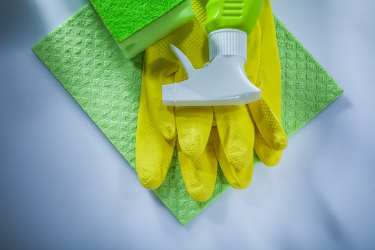 Cleaning washcloth sponge sprayer safety gloves on white background