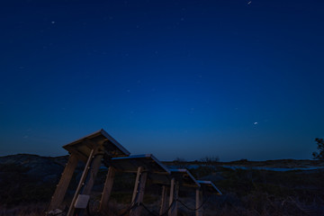 Solar panels under night sky