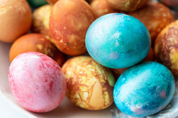 Closeup of colourful dyed Easter eggs.