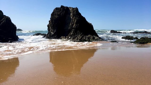 Landscape of Porto Covo beach, Portugal at sunset.