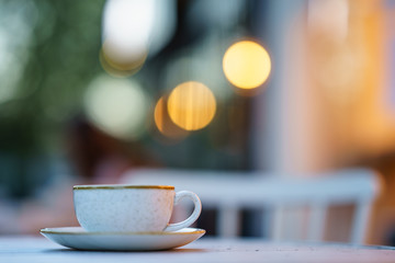 Coffee Milk and Foam with Bokeh Background
