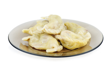 Plate with traditional ukrainian cherry damplings