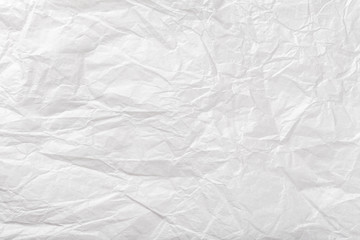 Crumpled white wrapping paper, closrup.