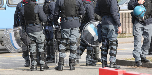 police team in riot gear before the sport to avoid scuffles
