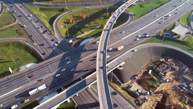 Aerial view of a freeway intersection traffic trails in Moscow.