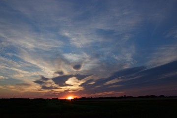 Summer Alberta prairie sunset with clouds