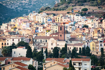 The beautiful village of Bosa with colored houses and a medieval castle on the top of the hill....