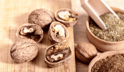 Fototapeta na wymiar walnuts and dry spices close-up