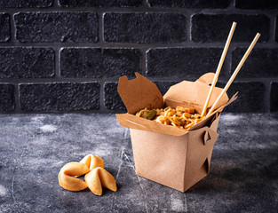 Box with  noodles and fortune cookies