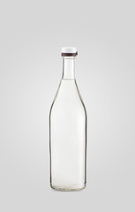 closed transparent bottle of drink on white background with shadow
