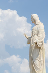 white statue of Jesus on the hill, place of prayers outside