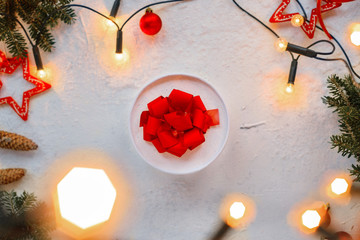Christmas decoration and light, christmas present with red ribbon on white background. Eye bird...