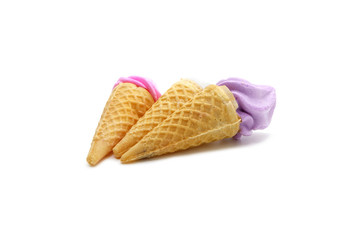 Meringues in mini cone isolated on white background.