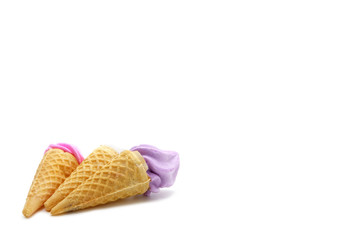 Meringues in mini cone isolated on white background.