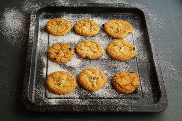 raisin cookies on a flour pan