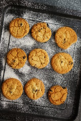 raisin cookies on a flour pan