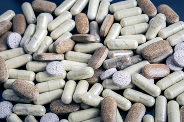 some pills of different size and shape