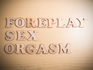Sex Foreplay Orgasm, lifestyle health wooden words typography lettering concept