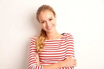 Confident young woman studio portrait