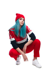 Trendy hip-hop young woman in squat