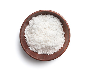 Sea salt in wooden bowl on white background,top view