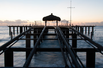 Late evening pier on the beach