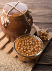 Salted soy beans paste on wood background
