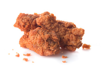 Spicy fried chicken wings on white background