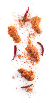 Spicy fried chicken wings on white background