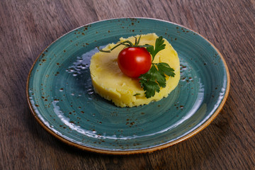 Mashed potato served tomato