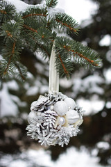 Christmas toy on the tree close up