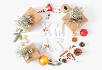 Christmas decoration wreath white background flat lay top view