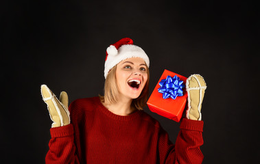 Celebration christmas holiday. Beautiful excited sexy woman wearing santa clause costume with...