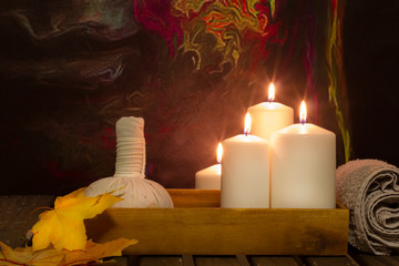 burning candles in wellness spa