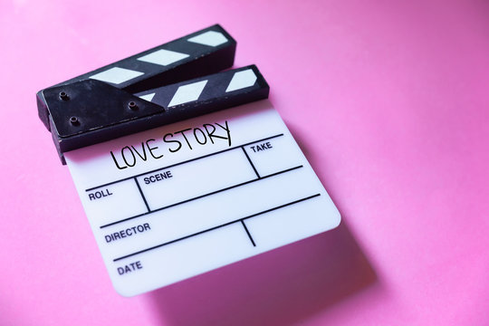 Love story ,text title on white movie Clapper board