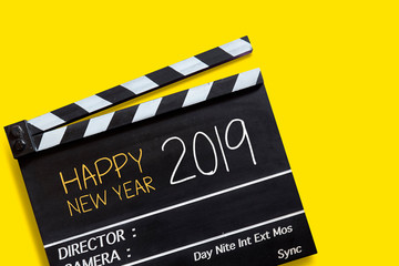 Fototapeta na wymiar Happy new year 2019 ,text title on movie Clapper board