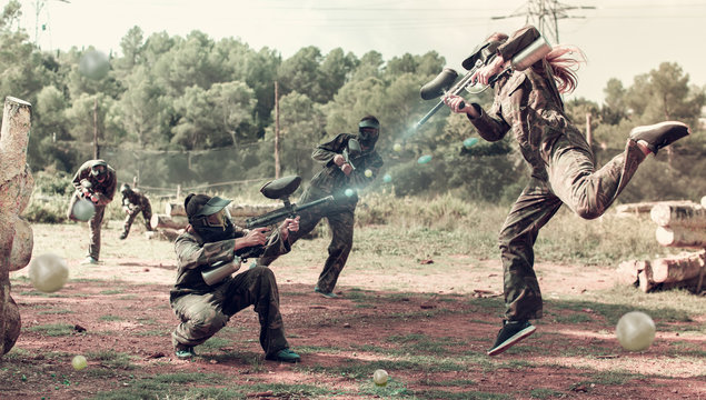 Portrait female player jumping and aiming marker on player of op