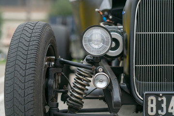 Close up of vintage car bumber and lamps