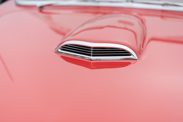 Close up of vintage red car vents