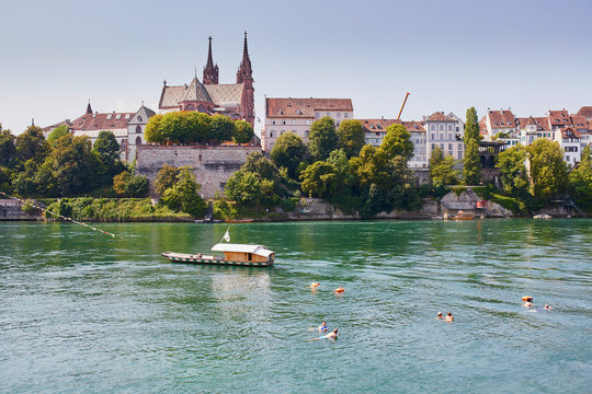 Scenic view of Rhine embankment with ferry boat in Basel, Switzerland