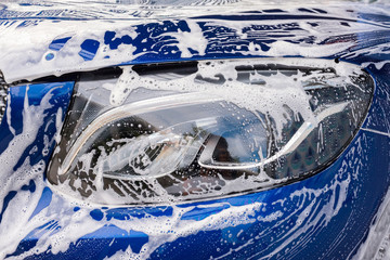 Car detail close up. The car on car wash