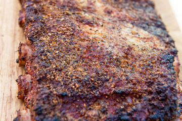 St Louis style grilled pork ribs on cutting board