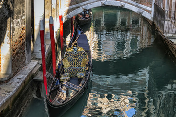 Venice, Italy - 2/21/2016.Gondola moored in canal Grande;
